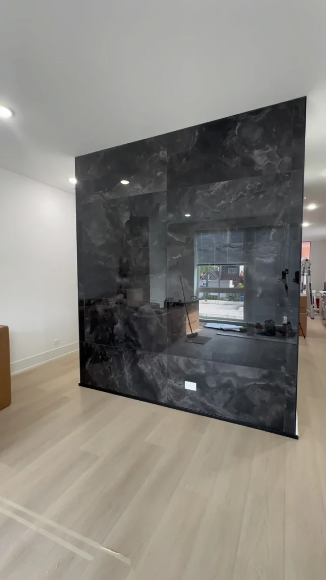 Entertainment room accent wall. 24” x 48” tile.  #viralreels #fyp #foryoupage #keephammering #keepbuilding #masterpiece #godisamazing #remodeling #accentwall