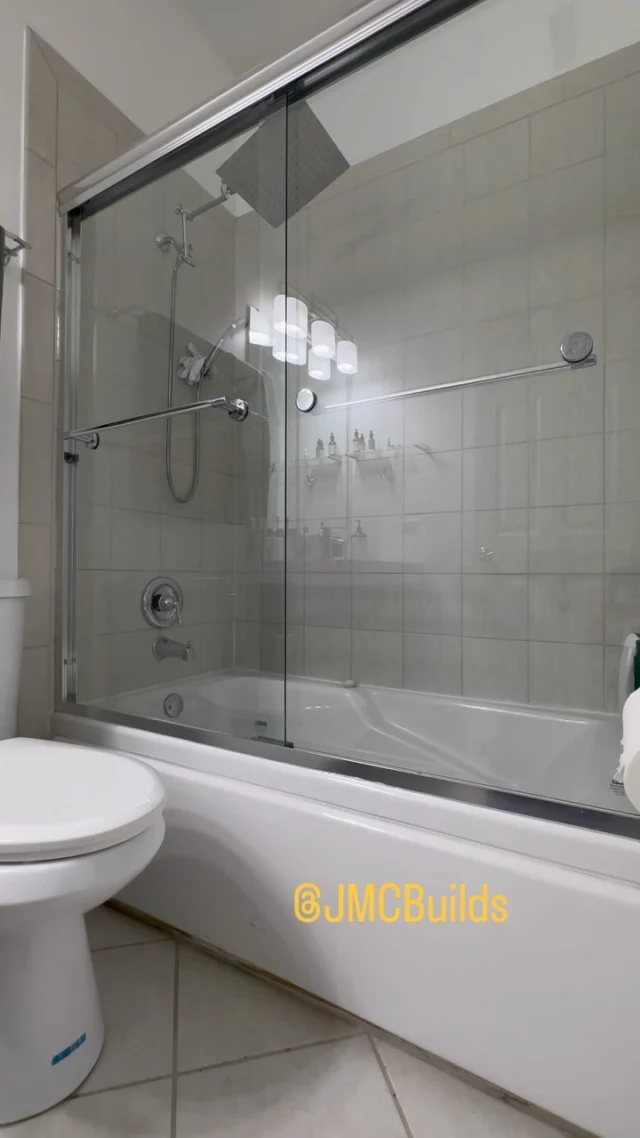 Glass bathtub door install #fyp #keephammering #construction #viralreels #remodeling #keepbuilding #lovewhatyoudo #john316 #godisgreat #foryourpage